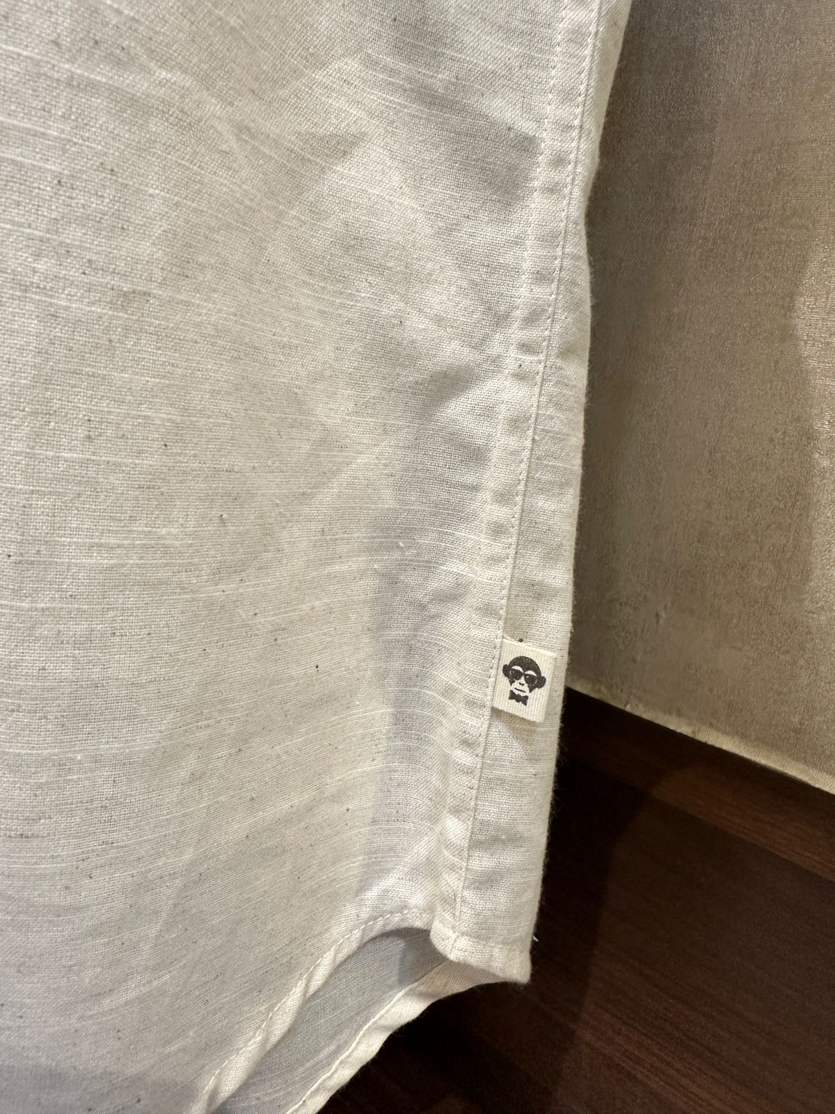 Off white shirt with EMBD