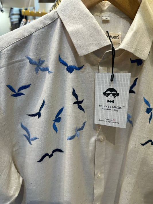 Off white shirt with EMBD